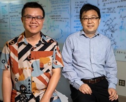 Peng Liu poses with member of Liu Group