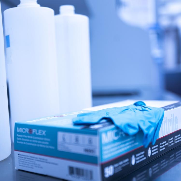 Plastic bottles and medical gloves